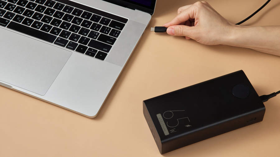How powerful of a power bank do you need to safely charge a laptop?